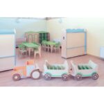 I mobili contenitori Trattore Libreria carrellata a 3 scomparti in legno By Habitat per Bambini di 2H arredi per asilo